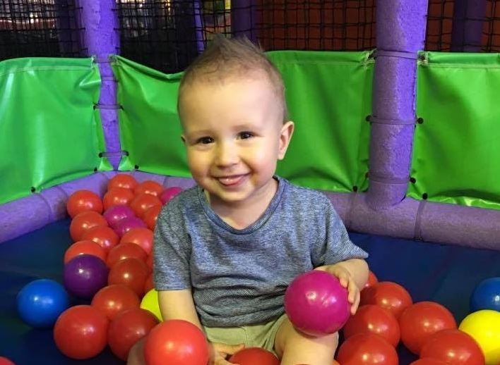 Young boy in ball pit